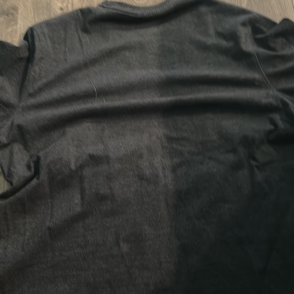 A champion tee shirt with the word champion written on the front of the shirt - Picture 2 of 2